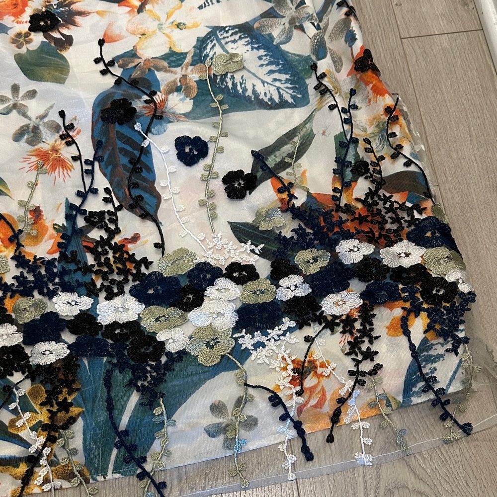 Plus Size Floral Sleeveless Dress with Embroidered Hem - Picture 2 of 7